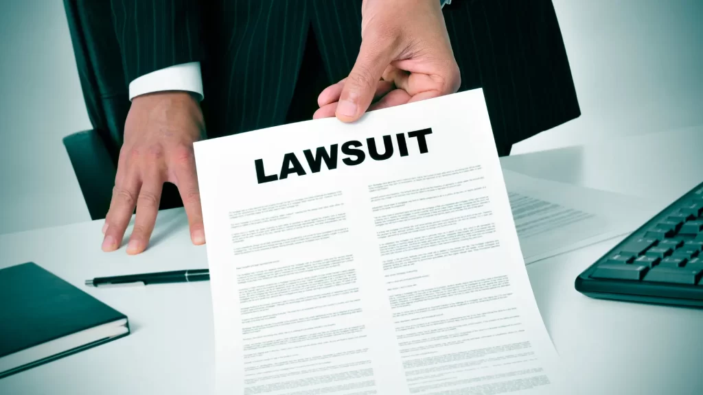 a close-up of a chicago car accident lawyer holding a piece of lawsuit paper